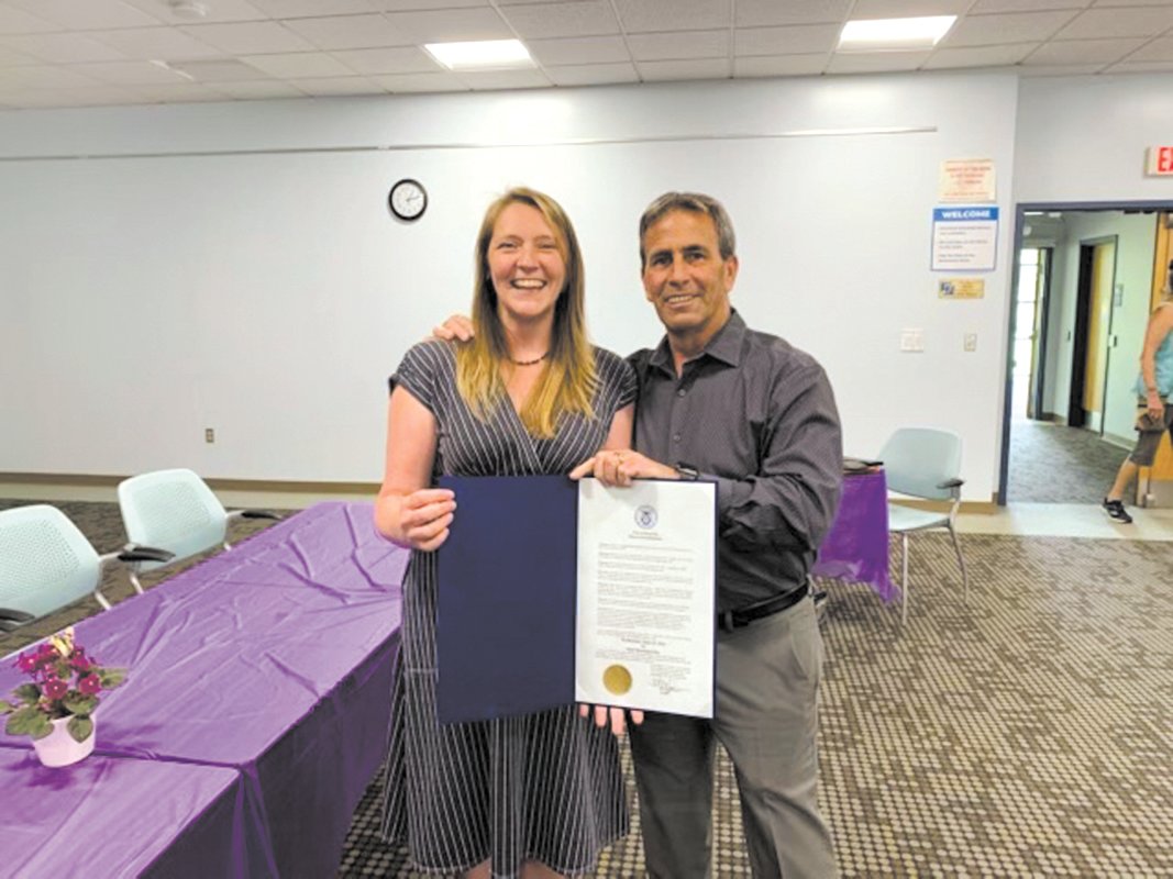 As a way to celebrate her 10 year career with the Warwick Public Library  Mayor Frank Picozzi presented outgoing Library Director Jana Stevenson with a proclamation on Wednesday afternoon during a celebration. (Submitted photo)